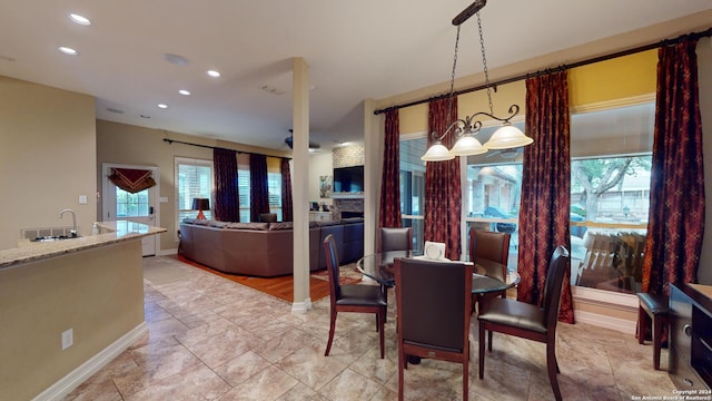 dining area with sink and a healthy amount of sunlight