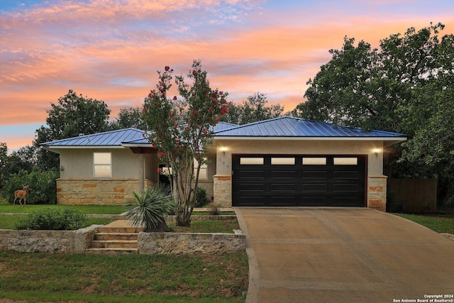 view of front of house with a garage