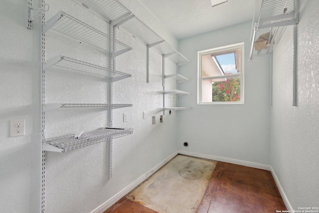 washroom featuring electric dryer hookup and washer hookup