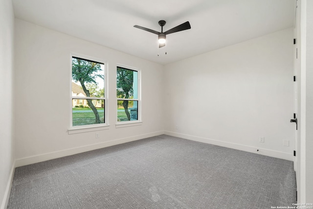 unfurnished room featuring carpet floors and ceiling fan