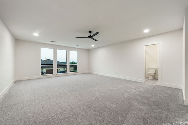 carpeted empty room with ceiling fan