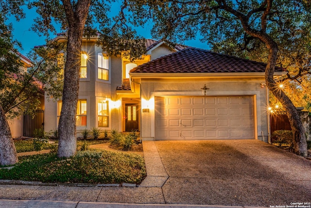 view of front of property with a garage