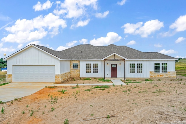 ranch-style home with a garage