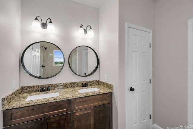 bathroom featuring double vanity