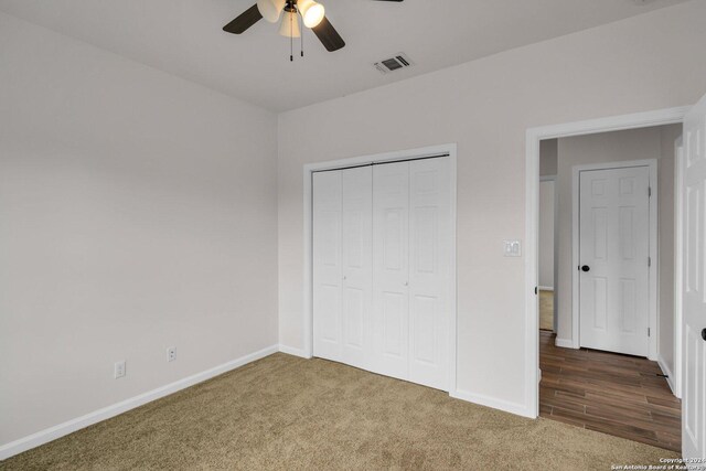 clothes washing area with electric dryer hookup, washer hookup, hardwood / wood-style flooring, and gas dryer hookup