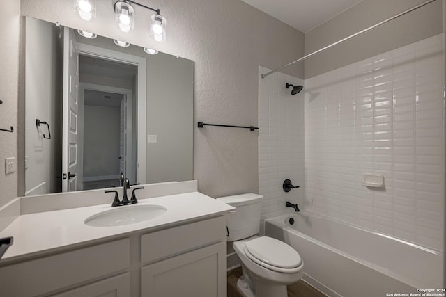 full bathroom featuring vanity,  shower combination, and toilet