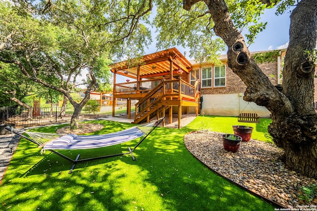 exterior space with ceiling fan and a deck