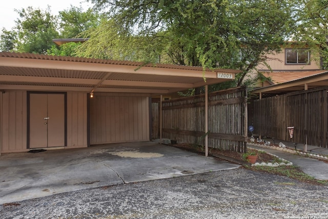 view of car parking with a carport