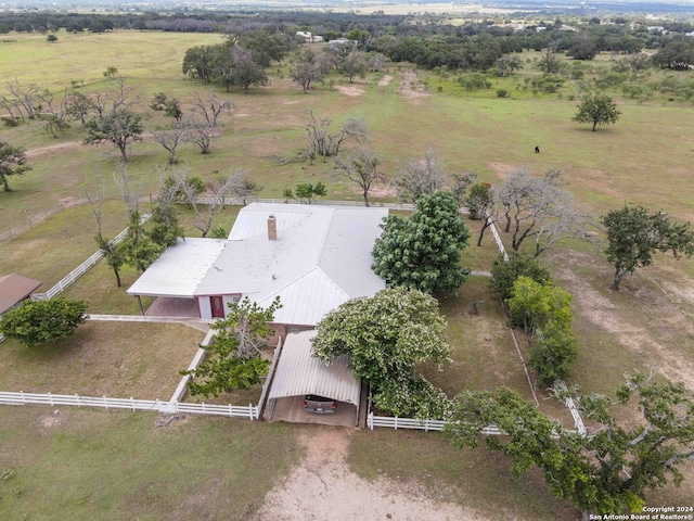 birds eye view of property featuring a rural view