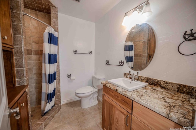 bathroom with vanity, tile patterned floors, toilet, and a shower with shower curtain