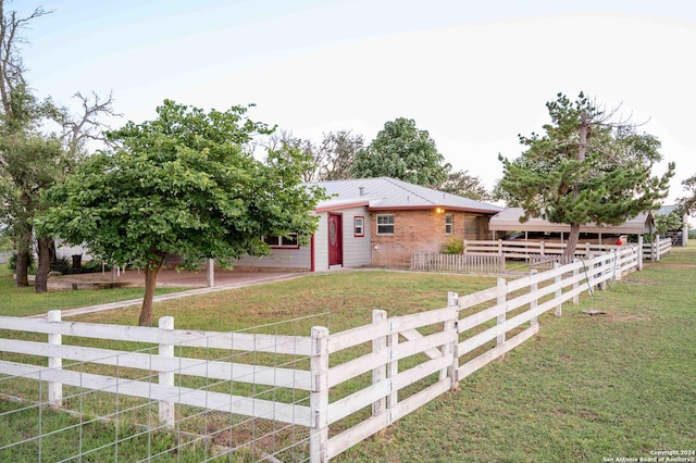 view of front of home with a front lawn