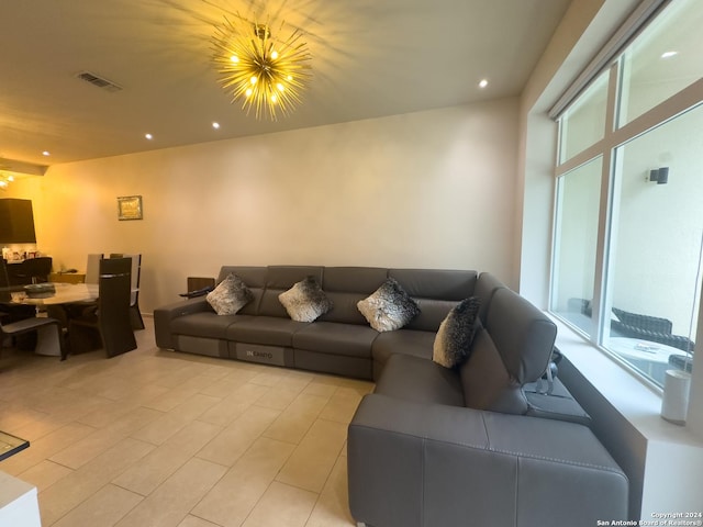 living room featuring an inviting chandelier