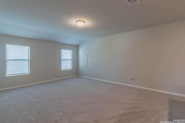 unfurnished room with carpet flooring