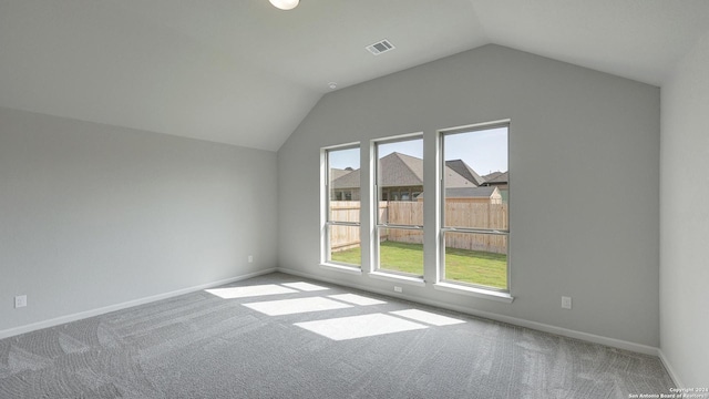 bonus room featuring carpet and vaulted ceiling