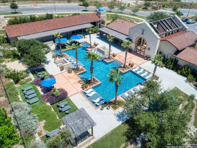 view of swimming pool with a patio