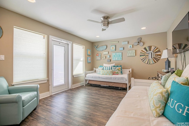 bedroom featuring dark hardwood / wood-style flooring and ceiling fan