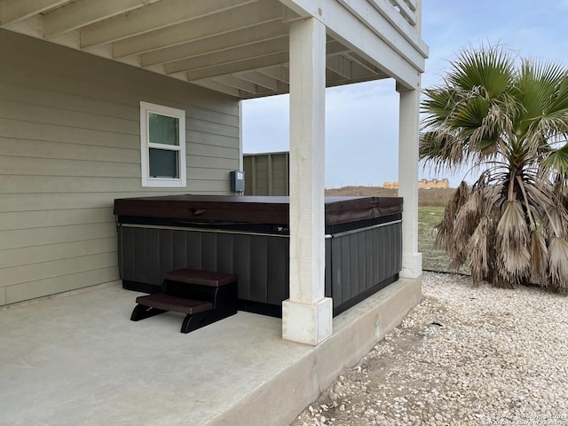 view of patio featuring a hot tub