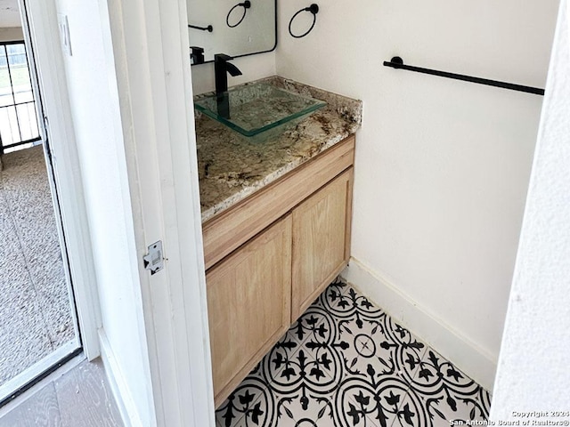 bathroom featuring vanity and tile patterned floors