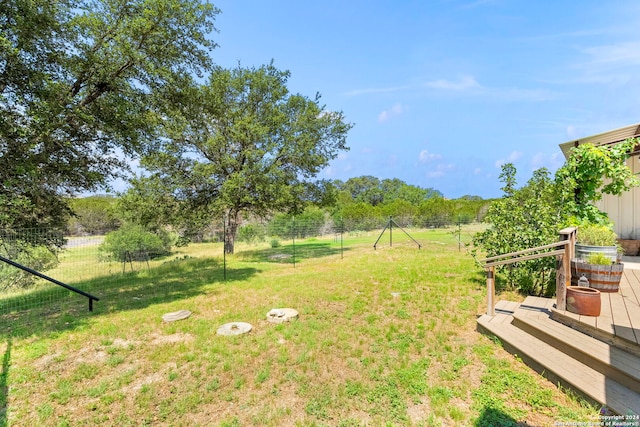 view of yard with a deck