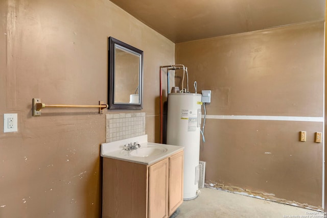 bathroom featuring vanity with extensive cabinet space and electric water heater