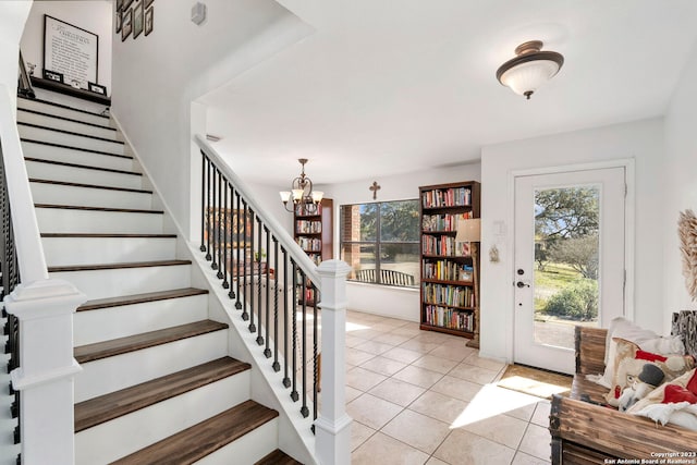 interior space featuring plenty of natural light and an inviting chandelier