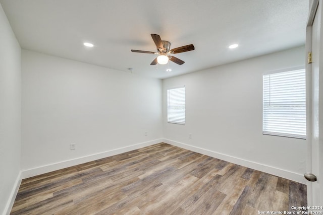 unfurnished room featuring wood-type flooring and ceiling fan