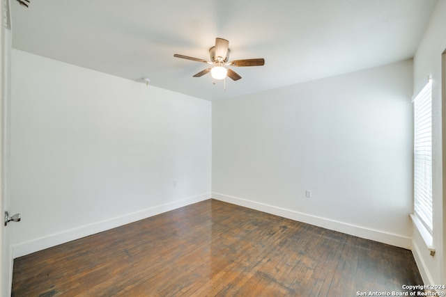 unfurnished room featuring hardwood / wood-style floors and ceiling fan