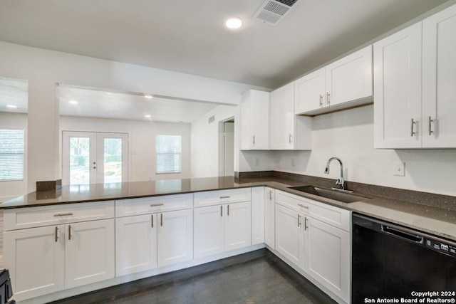 kitchen with white cabinetry, dishwasher, sink, and kitchen peninsula