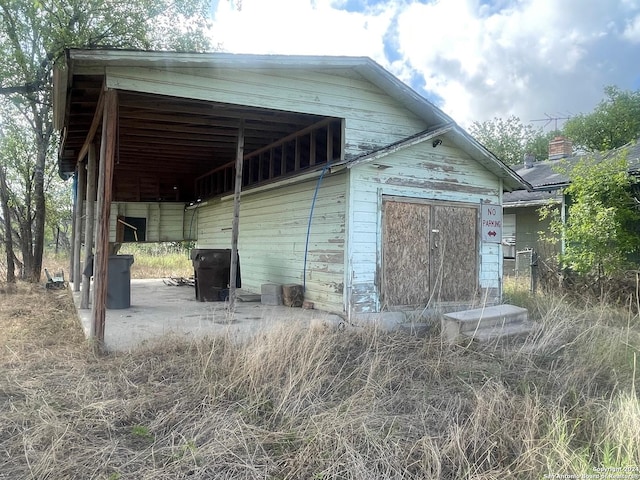 view of outdoor structure featuring a carport