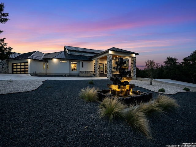 view of front of home featuring a garage