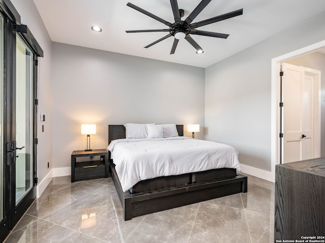 bedroom with tile patterned flooring and ceiling fan