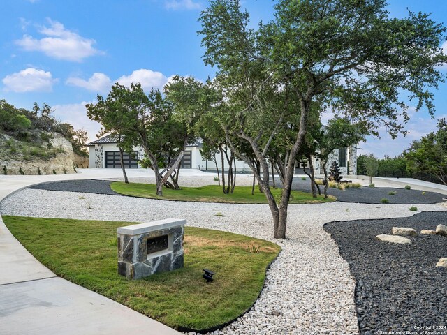 view of community featuring a yard