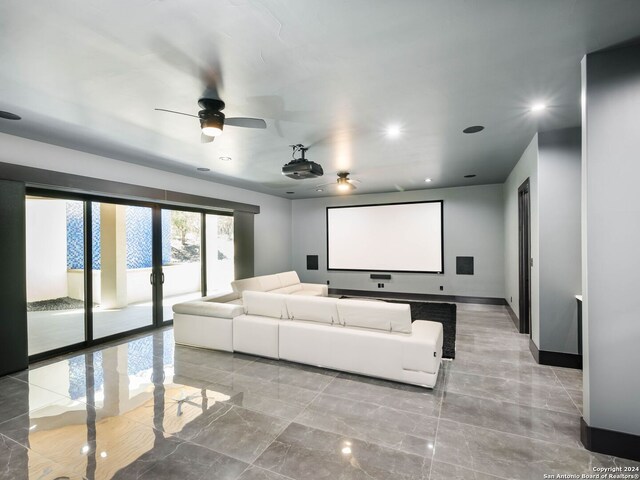 tiled cinema room with ceiling fan