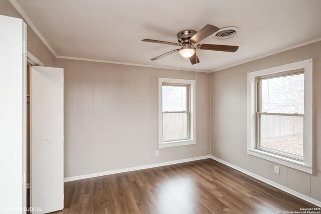 bathroom with walk in shower, vanity, and toilet