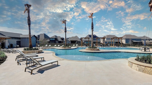 view of swimming pool featuring a patio area