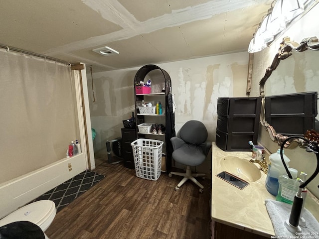 home office featuring sink and dark hardwood / wood-style floors