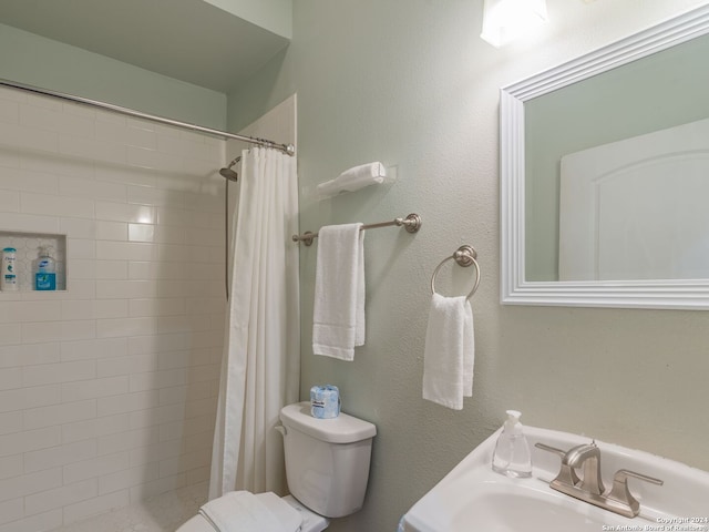 bathroom with sink and toilet