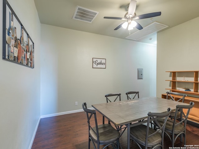 dining area featuring dark hardwood / wood-style flooring and ceiling fan