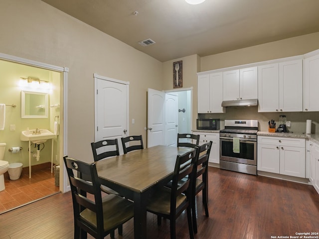 interior space featuring dark hardwood / wood-style floors and sink