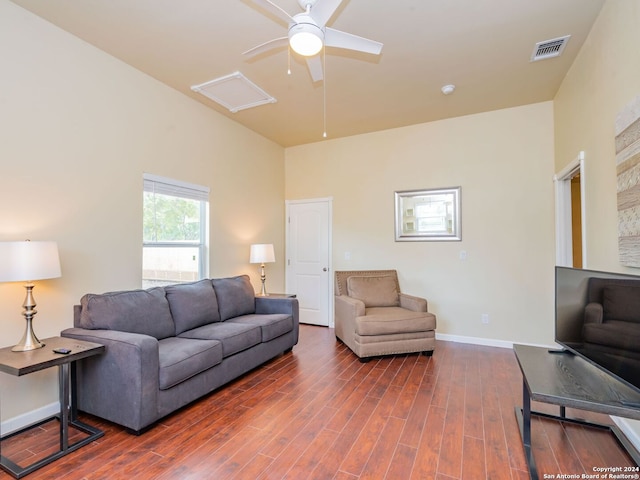 living room featuring ceiling fan and hardwood / wood-style floors