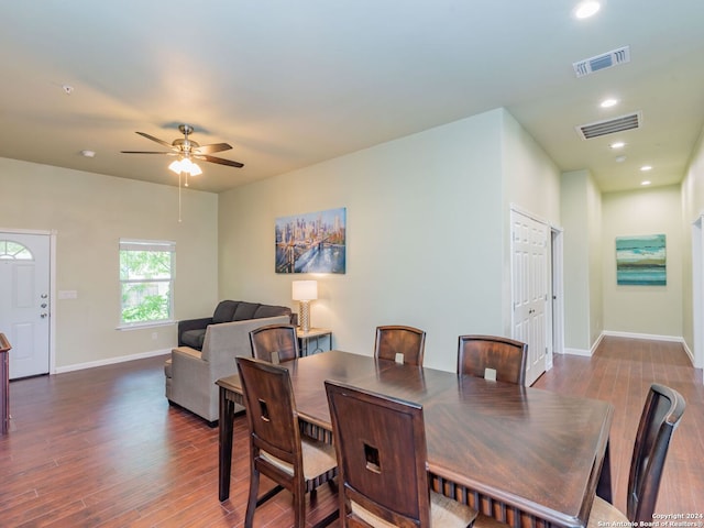 dining area featuring dark hardwood / wood-style floors and ceiling fan