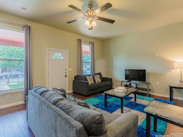 living room with plenty of natural light, ceiling fan, and hardwood / wood-style floors