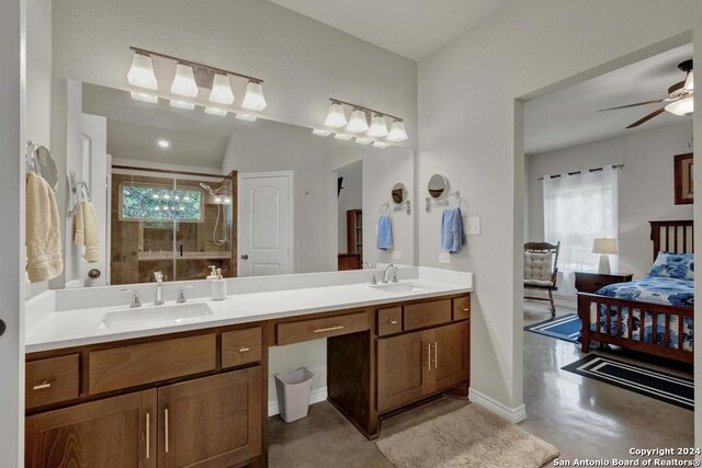 120 Sierra Way, Canyon Lake, TX 78133 - bathroom featuring plenty of natural light, ceiling fan, concrete flooring, and a shower with door