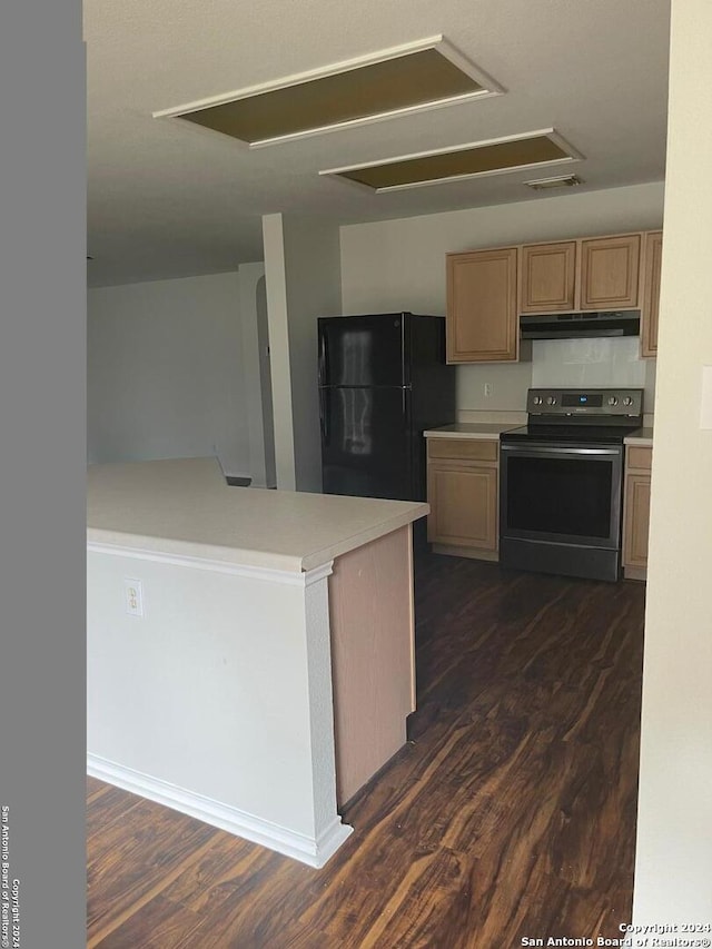 kitchen with black fridge, light brown cabinetry, dark wood-type flooring, and electric range oven