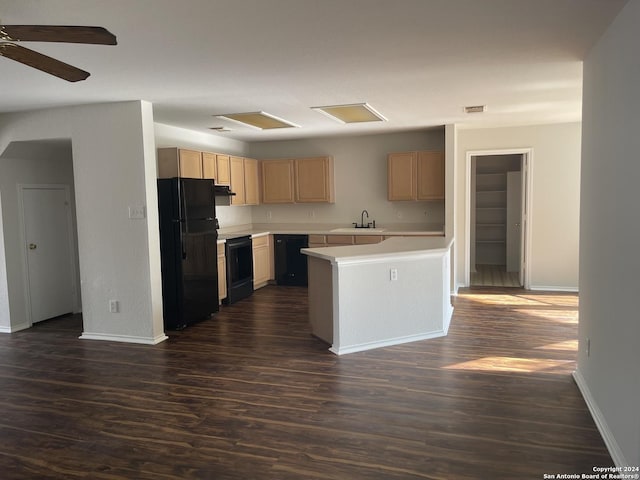 kitchen with sink, dark hardwood / wood-style floors, light brown cabinetry, a kitchen island, and black appliances