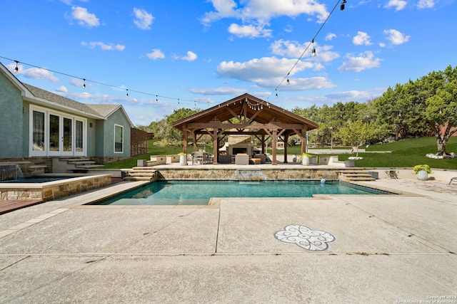 view of pool with a patio, a gazebo, and a lawn