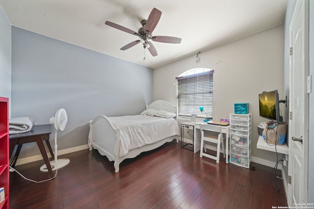 bedroom with dark wood-type flooring and ceiling fan