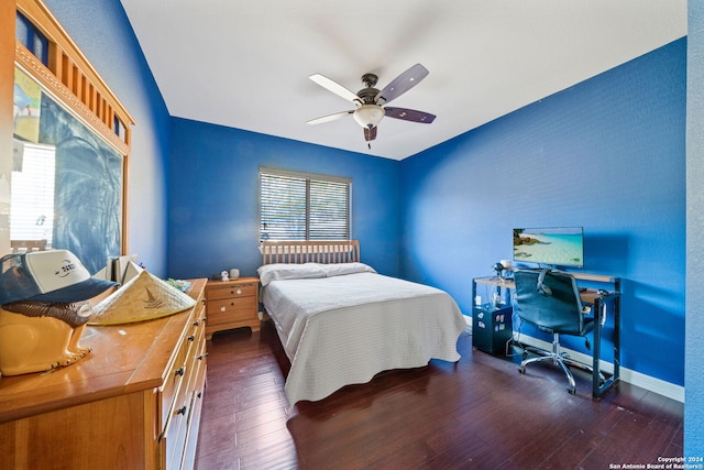 bedroom featuring dark hardwood / wood-style floors and ceiling fan