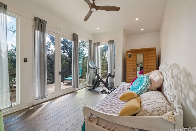 sitting room featuring hardwood / wood-style floors and ceiling fan