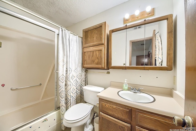 full bathroom with shower / tub combo with curtain, vanity, a textured ceiling, and toilet